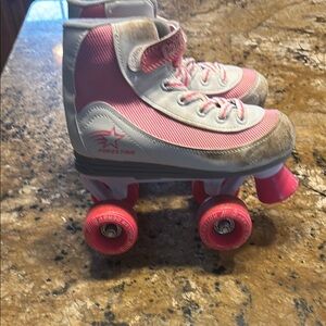Pink and White Roller Skates with Pink Wheels